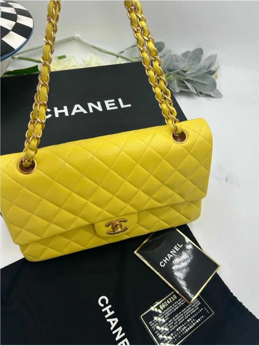 Women’s Chanel, classic quilted double flap bag in yellow with Gould hardware